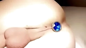Twink with tight balls puts butt plug in tight hole