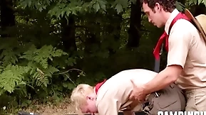 Camp trainer motivates twink to workout