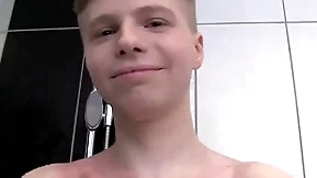 Cute soapy boy alone in a shower