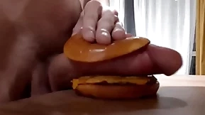 Muscular horny teen fucks a burger regarding a big dick and cums in it