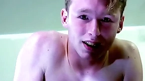 A straight blond boy is near tears while being spanked