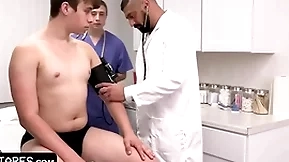 Adorable innocent patient is fully submitting to doctor and his student during physical examination